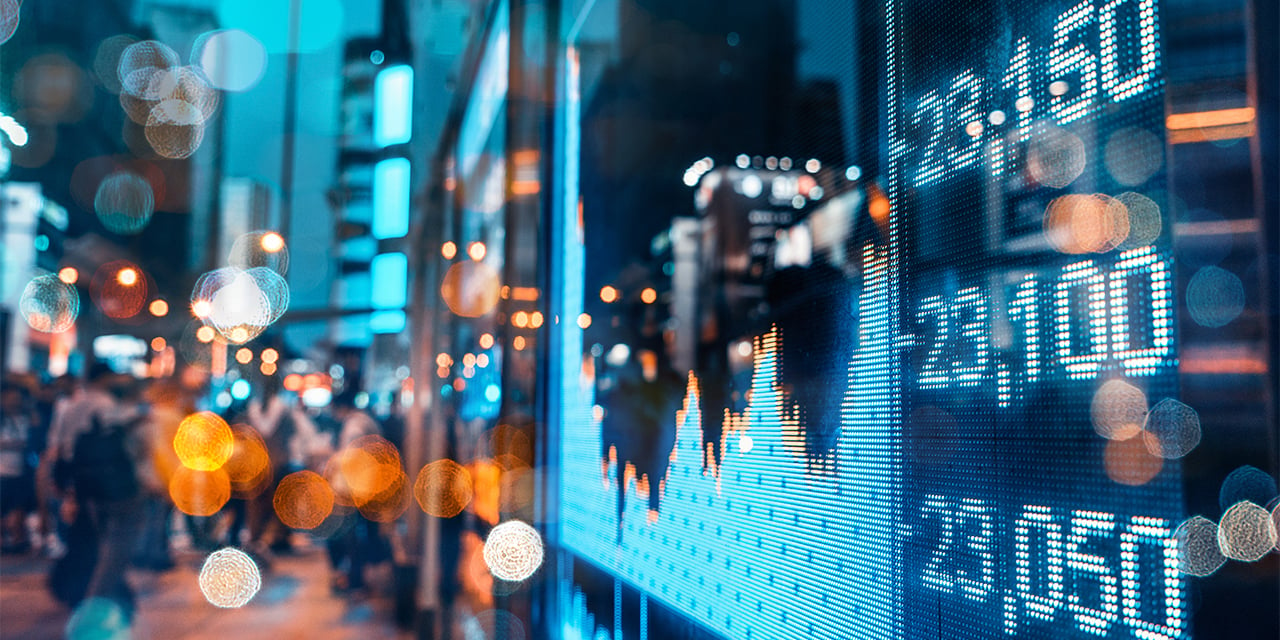 Abstract image showing Wall Street and a video ticker