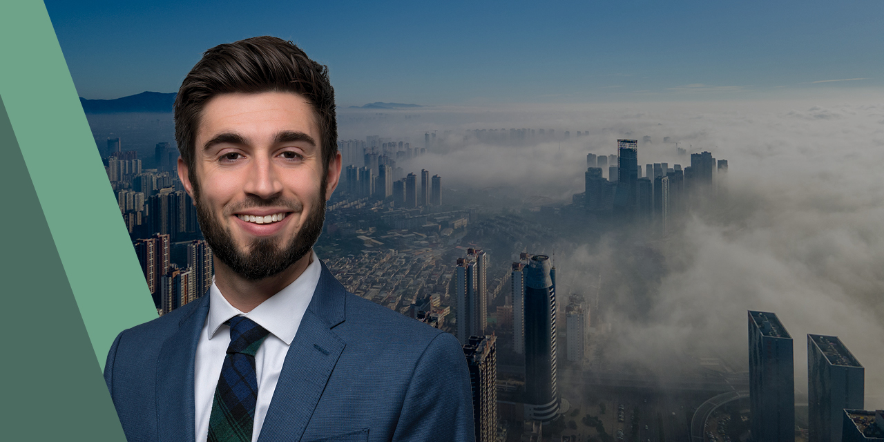 Headshot of Ross Mayfield with an arial shot of a city in the background.