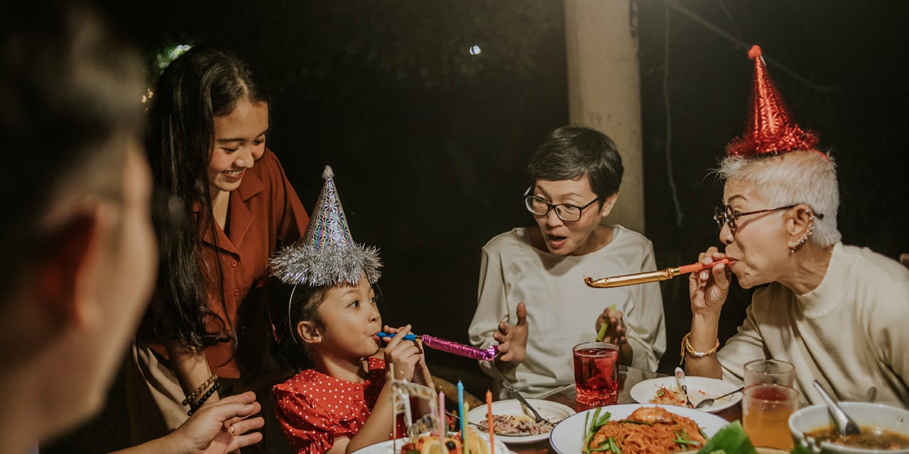 Multigenerational family celebrating a birthday.