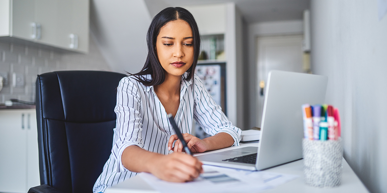 Young woman working from home.