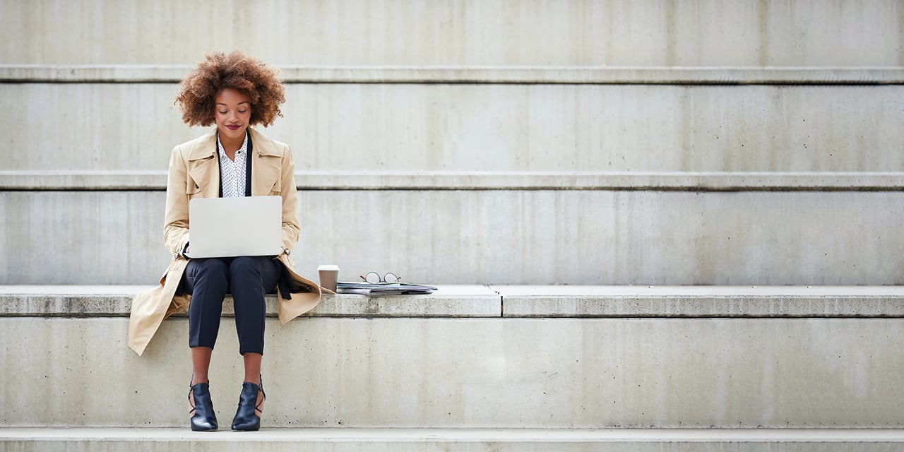 Young woman working on a laptop.