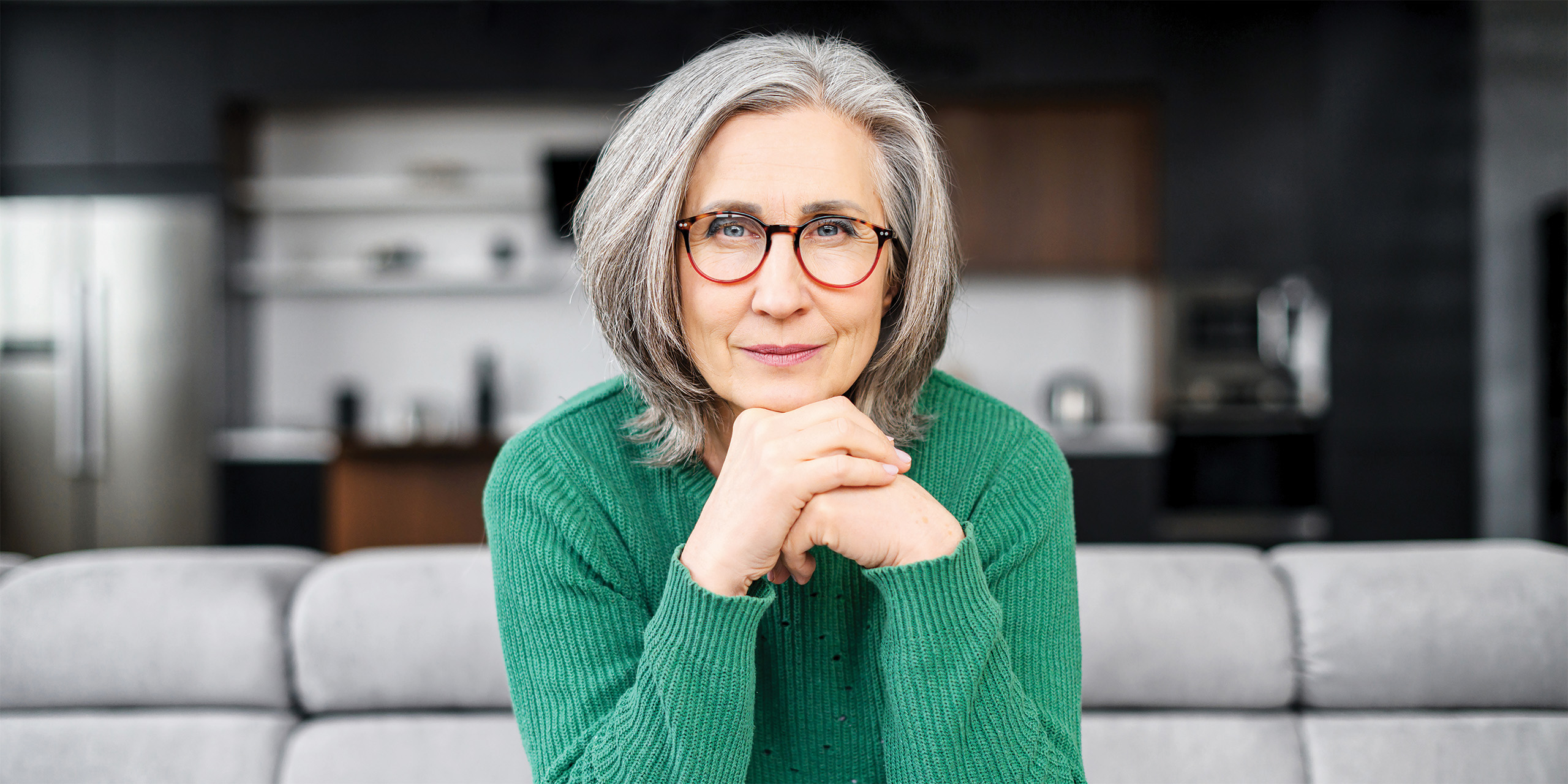 Woman wearing a green sweater